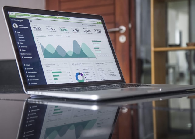 Laptop showing SEO results graph
