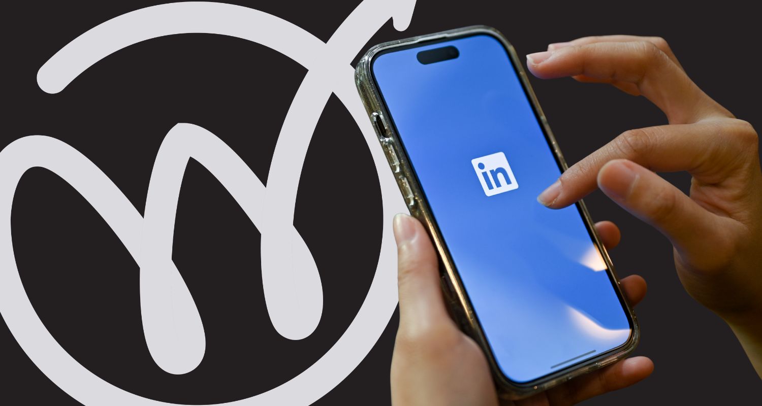 a person on a smartphone using linkedin search engine
